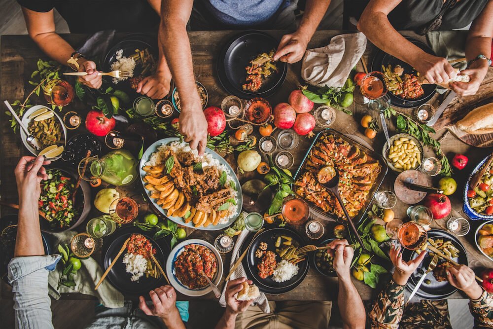 Top View of Family Enjoying Holiday Food_The Pavilion Senior Living